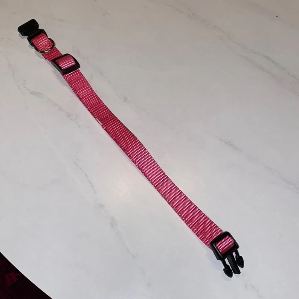 Pink pet collar, adjustable sizing, bright pink, black closure, .5” wide dog cat
